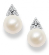 Polished to a T. These simple, yet stunning, stud earrings highlight cultured freshwater pearls (7 mm) and a pretty crown of diamond accents. Approximate diameter: 1/2 inch.