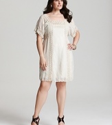 Lush lace trims the relaxed silhouette of this Johnny Was dress, imparting a vintage feel to your look.