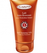 Self Tanning Milk with Sun Protection, SPF 6. Perfect for those who want a healthy golden tan, with or without the sun. The fluid, lightweight, milky formula helps achieve an even, natural-looking tan within approximately two hours of application. Safeguards skin with reinforced SPF 6 sun protection. Moisturizes skin to help prevent dehydration and preserve its youthful beauty. Ideal for face and body. 4.4 oz. Imported from France. 