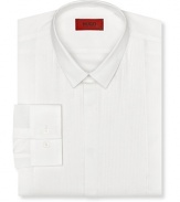 Slim fit tuxedo dress shirt with intricate pintuck detail in front. Small point collar. Barrel cuffs.