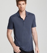 This slim fit polo is crafted in a modal and wool blend for a super breathable feel and body-hugging drape.