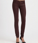 Glossy finish gives these leggings-style skinnies a leather-like look. THE FITRise, about 8Inseam, about 33THE DETAILSButton closureZip flyFour-pocket style98% cotton/2% polyurethaneMachine washMade in USA of imported fabricModel shown is 5'11 (178cm) wearing US size 4.