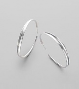 EXCLUSIVELY AT SAKS. Sophisticated hoops in polished sterling silver are subtly tapered from the middle. Sterling silver Diameter, about 2 Post back Imported