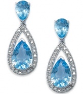 Bright blue hues brighten any look. Set in sterling silver, these teardrop-shaped earrings feature pear-cut blue topaz (6-1/2 ct. t.w.) and sparkling round-cut diamonds (1/5 ct. t.w.). Approximate drop: 1 inch.