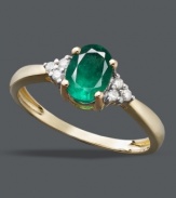 Never go unnoticed. A vibrant oval-cut emerald (5/8 ct. t.w.) surrounded by round-cut diamond accents adds the perfect touch of color to your look. Set in 14k gold.