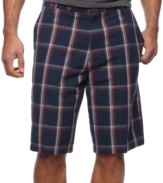 A big bold plaid print enlivens your summer style with these shorts from master of leisure Tommy Bahama.