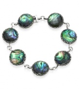 Inspire your look with ocean color. Genevieve & Grace's pretty link bracelet features round-cut abalone glass and glittering marcasite. Set in sterling silver. Approximate length: 7 inches.