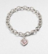 A sweet style with a textured sterling silver link chain and a pink crystal heart charm. Pink crystalSterling silverLength, about 7.5Lobster clasp closureImported 