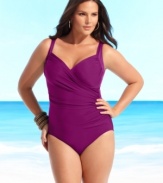 Showcasing graceful lines and sleek sophistication, this plus size swimsuit by Miraclesuit whittles your middle and exudes a carefree attitude at the same time.