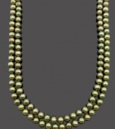 An instant style revival. Two rows of shimmering green cultured freshwater pearls (8-9 mm) add a spring-time touch to any look. Clasp crafted in sterling silver. Approximate length: 18 inches.