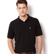 All hands on deck for style with this classic polo shirt from Nautica.