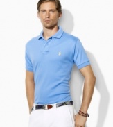 A classic short-sleeved polo shirt is cut for a relaxed, comfortable fit in smooth, soft cotton interlock.