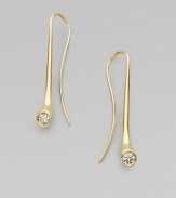 Smooth, curvaceous shapes of 18k yellow gold are punctuated by brilliant diamonds.Diamonds, 0.20 tcw 18k yellow gold Drop length, about 1¼ Ear wire Imported