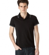 Modern minimalism. This Calvin Klein polo shirt is a sleek sporty look for the weekend.