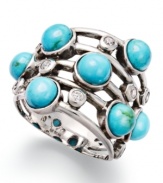 Layer it up with this trendy style. Avalonia Road's five-row stacked ring features round turquoise stones (1-1/4 ct. t.w.) mixed with sparkling crystals for a playful look. Set in sterling silver. Size 7.