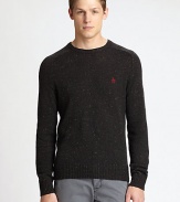 Classic crewneck sweater is impeccably knitted in a rich wool and cotton blend with contrasting donegal details, accented with an embroidered penguin detail at the chest.CrewneckRibbed knit collar, cuffs and hemWool/cotton/acrylicDry cleanImported