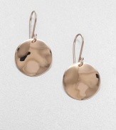 A simple and classic style featuring wavy discs in sterling silver and 18k gold, finished in the warm glow of 18k rose goldplating. Sterling silver and 18k gold with 18k rose goldplatingDrop, about 1.1Hook backImported 