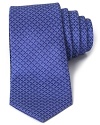 Rich color and a cool, optical pattern define this luxurious silk tie cut in a classic width from the iconic designer Valentino.