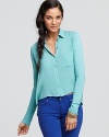 With a chic high/low hemline and classic collar, Splendid retools the button-front shirt into a fresh idea for fall.