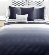 Vera Wang's Dip Dye Dot duvet cover boasts a Swiss dot pattern on an ombré ground that graduates from deep indigo to off-white. Finished with ric-rac trim for added flair. Reverses to self; hidden button closure.