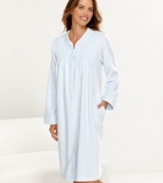 The coziness of terry cloth. Relax freely in this robe by Miss Elaine, featuring a snap front for easy on and off.