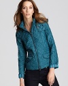 Cut from a vibrant turquoise, this lightweight Burberry Brit jacket adds a decadent dose of color to the everyday.