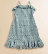 Intricately knit in a delicate pointelle pattern, this adorable linen dress boasts ruffled trim and a peplum hem for a sweet, girlie finish.Straight, ruffled necklineSpaghetti straps form a racerbackPull-on stylingRuffled hemLinenShell: 95% silk/5% elastaneDry cleanImported