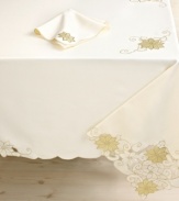 Make your holiday extra-special with the right setup. A traditional symbol of the Christmas season, a golden poinsettia motif graces this Shimmering Poinsettia tablecloth for a look of timeless elegance.