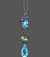 Express your individuality with a touch of the exotic. This elegant pendant features colorful marquise-, round- and pear-cut gemstones (8-3/8 ct. t.w.) and champagne diamonds (1/5 ct. t.w.) in a 14k white gold setting. Approximate chain length: 18 inches. Approximate drop: 2 inches.