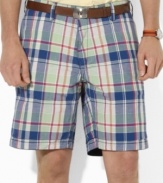 A versatile essential for every warm-weather wardrobe, a soft cotton chino short features one solid side and one madras side for a timeless, preppy look.