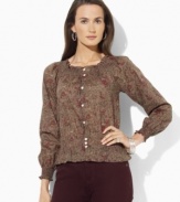 A delicate print accents Lauren Ralph Lauren's petite peasant top crafted from soft cotton with smocked accents for a romantic look.