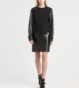 Leather sleeves, croc-print elbow patches and motorcycle-inspired details bring rocker vibes to this boxy wool-rich jacket. RoundneckAsymmetrical snap closuresDropped shouldersLong leather sleevesCroc-embossed elbow patchesSelf-beltBack rain flapAbout 27 from shoulder to hemBody: 80% virgin wool/20% polyamideTrim: LeatherDry clean with leather specialistImported of Italian fabricSIZE & FITModel shown is 5'10 (177cm) wearing US size 4. 