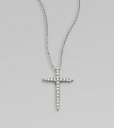 A beautiful cross that sparkles with diamonds in 18k gold on a chain link necklace. Diamonds, .1 tcw18k white goldLength, about 16 to 18 adjustablePendant size, about ½ Lobster clasp closureMade in Italy