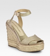 Espadrille wedge and canvas straps with a shimmering metallic finish. Hemp-covered wedge, 5 (125mm)Hemp-covered platform, 1 (25mm)Compares to a 4 heel (100mm)Metallic canvas and leather upperAdjustable ankle strapLeather and canvas liningRubber soleImported