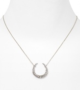 Dazzling Swarovski crystals shine on this horseshoe pendant necklace from Alexis Bittar.