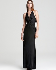 Minimalist yet statement-making, this Issa London halter gown is rendered in supple silk jersey for a slinky silhouette.