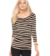 Layered tiers add a zigzag dimension to this graphically striped Vince Camuto top -- perfect adding the pop of a print to your outfit!