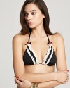 What's more romantic than rosettes and white lace? Betsey Johnson's bikini brings boudoir style to the beach.