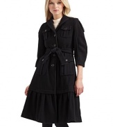 Military styling fused with ladylike influences for a luxurious wool overcoat that commands attention.Notched collar ¾ puffed sleeves with button tabs Front button closure Front button flap pockets Buckled belt ties at the waist Long ruffled hem About 40 from shoulder to hem Fully lined Wool; dry clean Made in Italy