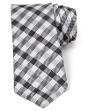 A nostalgic multi-tone check pattern features a narrower width for a modern silhouette and is crafted in plush silk.