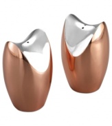 Polished to perfection, Classic Copper salt and pepper shakers unite Nambe's signature metal and warm copper in inspired shapes. Designed by Alvaro Uribe.