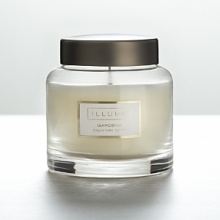 This indulgent Illume scented candle comes in ten splendid scents. Enjoy one (or all!) in pure luxury.Mediterranean - Coconut water and sea salt co-mingle with refreshing notes of bamboo, sea grass, vetiver, orange flower and fig.Thai Lily - Exotic notes of Bali mango, blood orange and white nectarine blend with Brazilian teak and Aziatic lily and a hint of tropical musk Tangerine Teakwood - Effervescent tangerine zest combines with sugar, teak and a touch of vanillaGardenia - This romantic floral is a true classicPineapple Cilantro - A bold combination of juicy pineapple and fresh cilantroOceano - Light leafy greens and summer fruits combine with hints of heady jasmine and white muskLemongrass - A refreshing blend of lemongrass, exotic verbena and white teaCoconut Milk Mango - A tropical fusion of mango and coconut milkStar Jasmine - A soft bouquet of star jasmine, wild rose, cyclamen blossoms and a hint of coconutTahitian - A sophisticated combination of grapefruit and cassis with undertones of cedar and musk