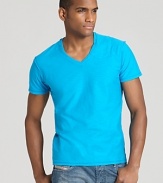 V-neck tee with a solid cotton shell and pocket detail at the neck.