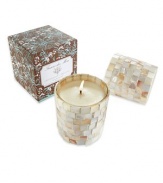 A delicate blend of White Honeysuckle and Baby Jasmine in a decorative mother-of-pearl vessel. An alluring scent and elegant warm glow will turn any room into a seaside retreat. Burn time is approximately 60 hours.