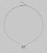 From the Love Britt Collection. Interlocking G heart pendant is front and center along a simple bead chain.Sterling silver Length, about 14 with 1 extender Width of pendant, about ¾ Lobster clasp closure Made in Italy 