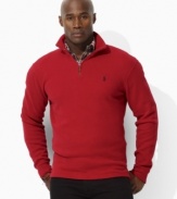 An essential long-sleeved half-zip pullover is designed for ultimate cozy comfort and masculine polish in breathable French-rib cotton.