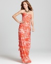 Elegant and individual, this BCBGMAXAZRIA strapless gown is set apart from the crowd with a vibrant print.