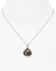 An elegant faceted labradorite pendant necklace from Coralia Leets.