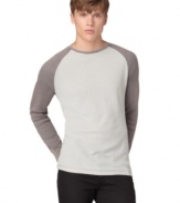 Simple yet stylish, this Calvin Klein Jeans baseball tee is a homerun.