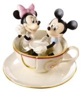 Take a ride back to classic carnival fun with this charming Disney figurine featuring Mickey Mouse and Minnie Mouse. Accented with 24-karat gold and measures 6.